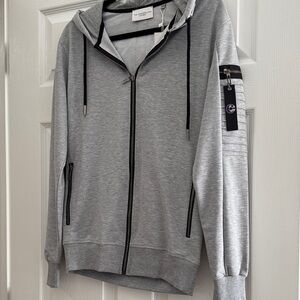 Cosmopolitan Gray Zip-Up Hoodie with Black Accents